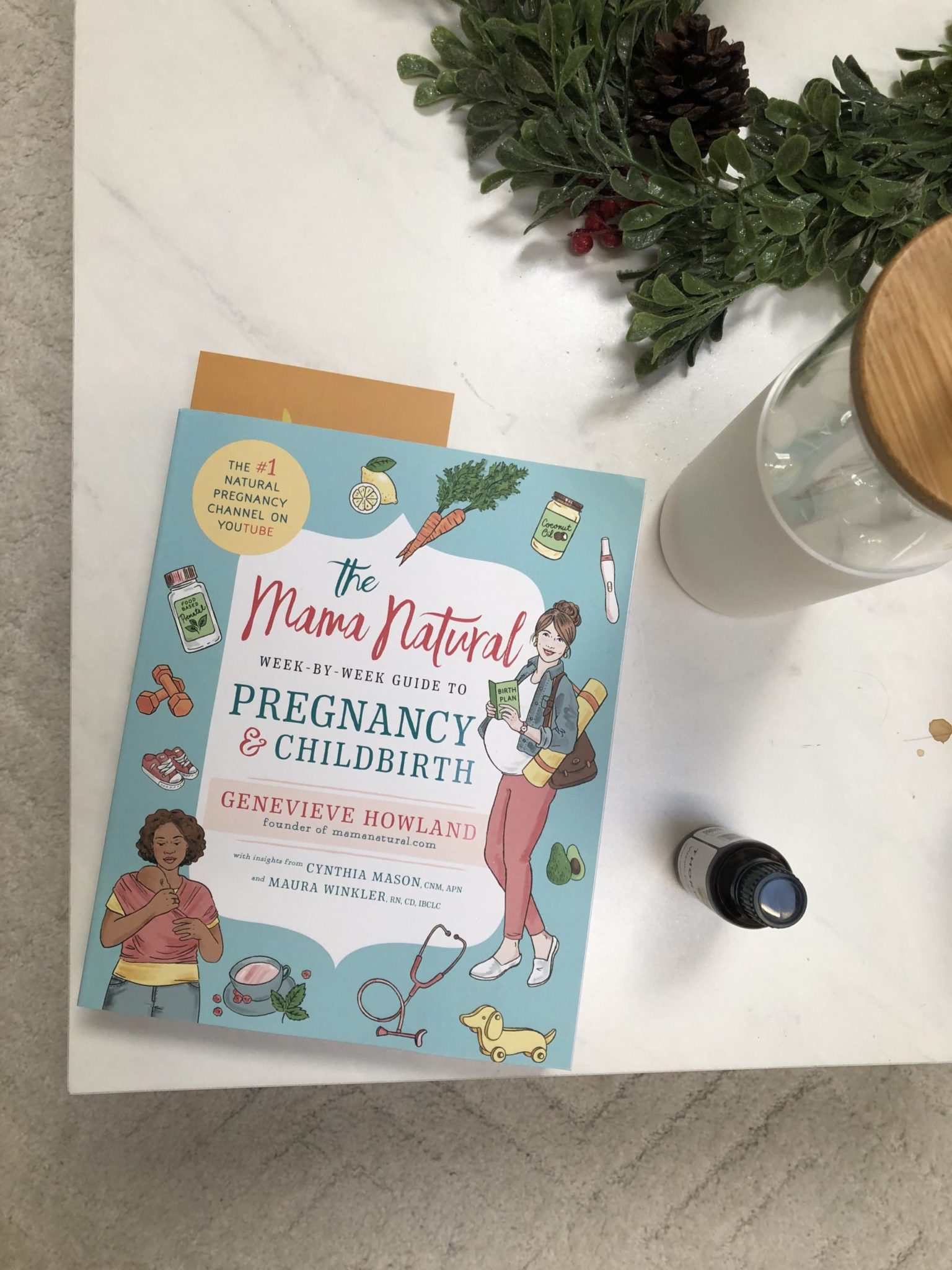 Mama natural book and the best water bottle for expecting moms at any stage of pregnancy with Elizabeth McCravy.